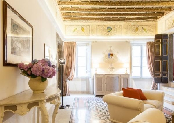 Center-Historic Jewish Quarter: Elegant apartment situated in beautiful Palazzo Nobiliare. Entrance, spacious living with original wood frescoed ceilings, large modern dining and kitchen, 4 bedrooms, 4 Baths, small terrace. #1527
