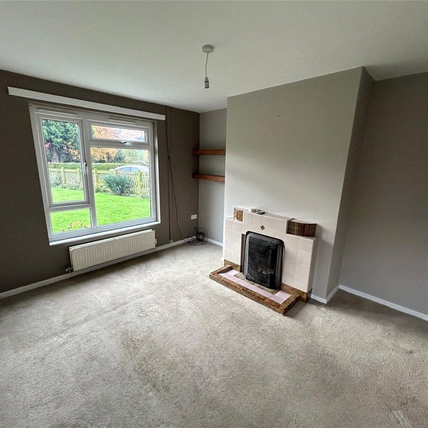 A three-bedroom semi-detached cottage located in the village of Llangedwyn. - Photo 1