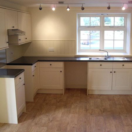 The Old School Rooms is a semi-detached cottage. It consists of a kitchen, utility room, living room with a multi-fuel stove, bathroom, downstairs WC and two bedrooms. The property benefits from oil central heating, off road parking and an enclosed rear garden. - Photo 1