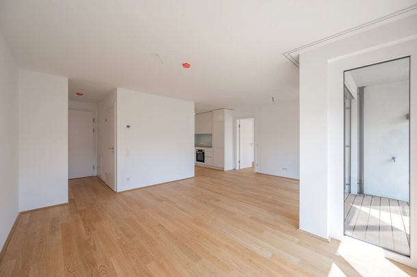 EDUART-Die Kunst des Wohnens: Hochwertige 2-Zimmer Neubauwohnung mit ca. 6m² Balkon/Loggia! (6/17) - Photo 1