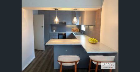 Three Bedroom Spacious Unit - Photo 2