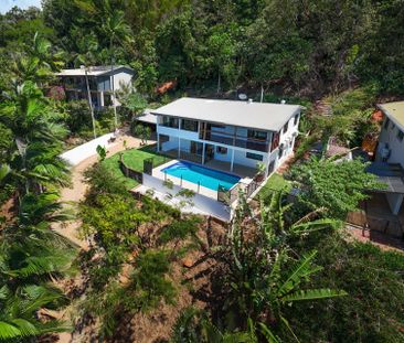 TWO-LEVEL HOME WITH PANORAMIC OCEAN VIEWS - Photo 1