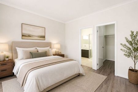 Comfortable Spacious Four-Bedroom Home with Double Garage & Classic Brick Appeal - Photo 5