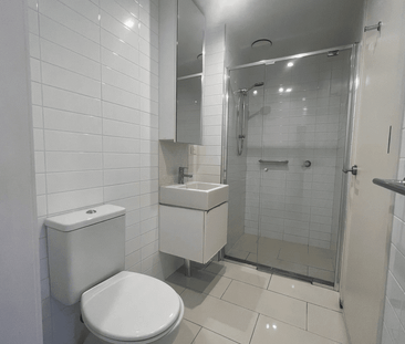 Modern One-Bedroom Apartment in a Highly Sought-After Complex - Photo 3