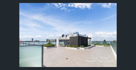 PERFECTLY LOCATED TWO BEDROOM UNIT! - Photo 2