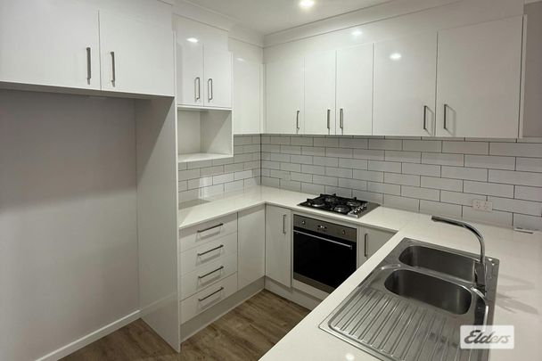 Spacious Townhouse in a Convenient Albion Park Location - Photo 1