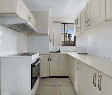 Modern 2-Bed Unit - Photo 4