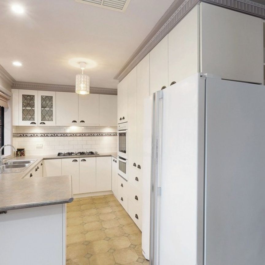 FOUR BEDROOM HOME IN QUIET STREET WITH LARGE BACKYARD - Photo 1