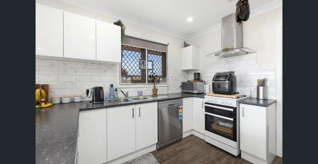 Renovated Family Home with Side Access and Outdoor Space - Photo 1