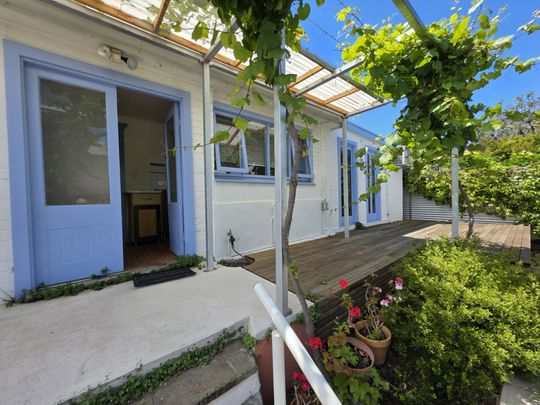 Character-Filled Coastal Cottage - Photo 1