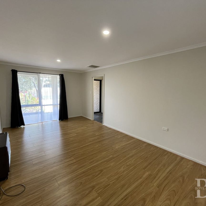 Refreshed Family Home with Spacious Yard and Powered Shed - Photo 1
