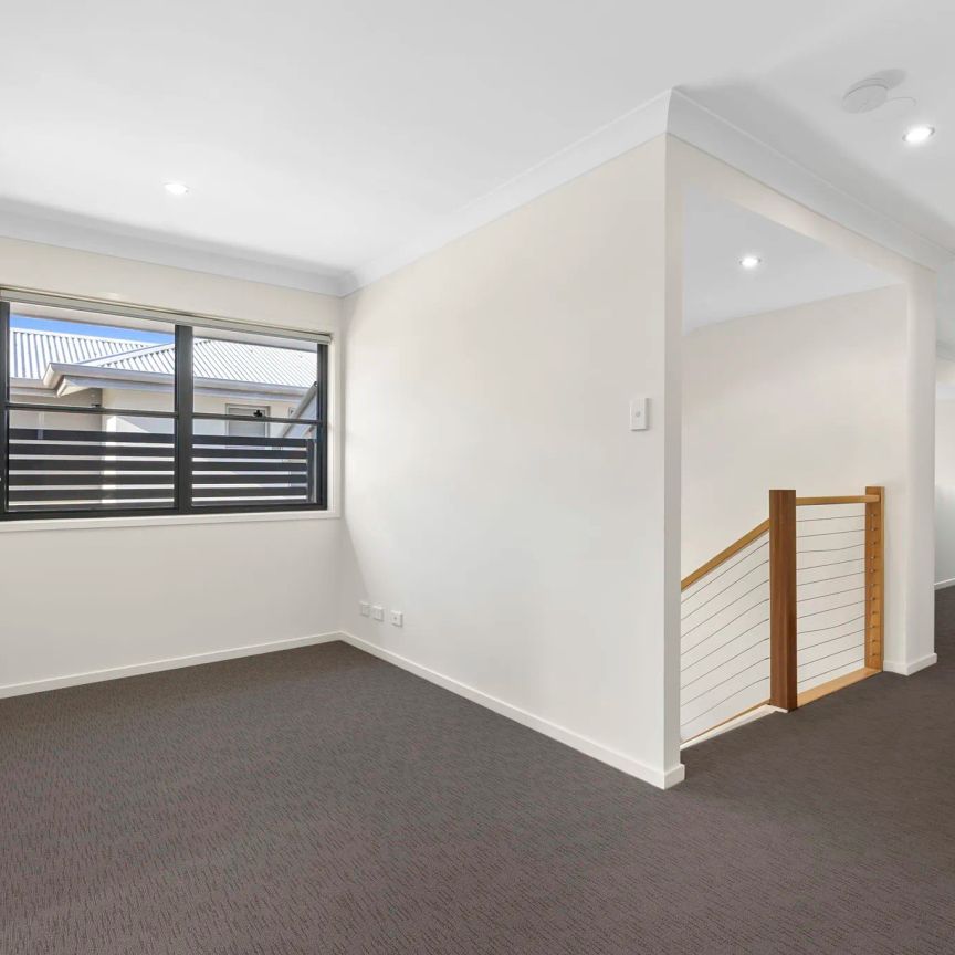 Modern Townhome in a Family-Focused Wakerley Estate - Photo 1