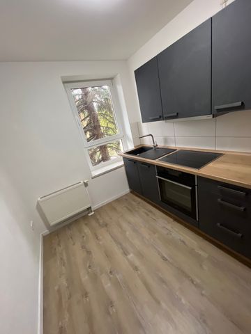 Praktische Singlewohnung mit moderner Einbauküche und Balkon! - Foto 5