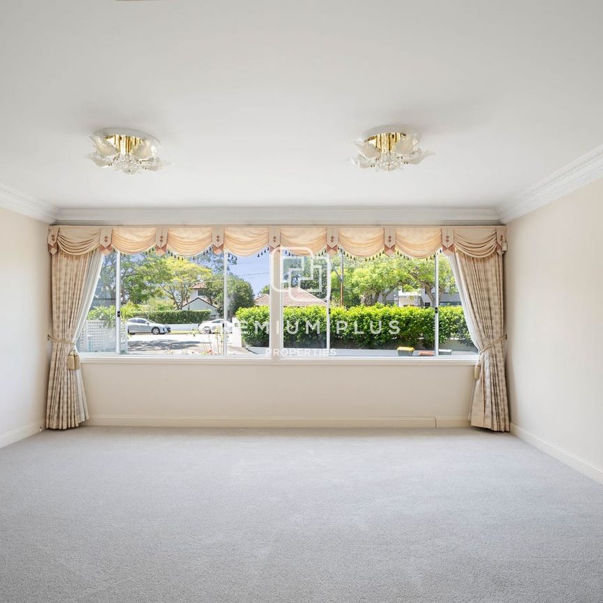 Elevated Family Home with Expansive Living & Leafy Outlook - Photo 1