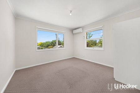 Spacious Three-Bedroom Home - Photo 2
