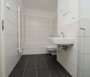 KOMFORTABEL WOHNEN IM NEUBAU - MIT BALKON, AUFZUG, FUSSBODENHEIZUNG UND EINBAUKÜCHE - Photo 5