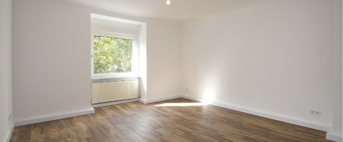 Charmante 3-Zimmer-Altbauwohnung in urbaner Citylage - Foto 1