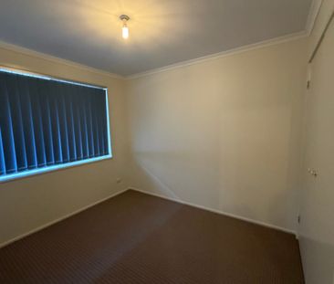 SPACIOUS FAMILY HOME WITH HUGE GARAGE SPACE - AVAILABLE NOW! - Photo 3