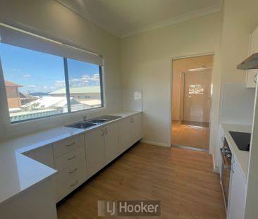WANT TO LIVE BY THE LAKE? WELL THIS UNIT IS FOR YOU!!FRESHLY RENOVATED - Photo 1