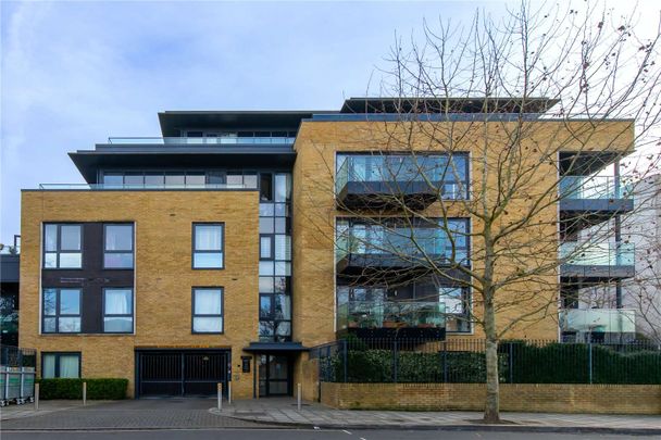 A fabulous two bed contemporary apartment with private balconies and secure parking. - Photo 1