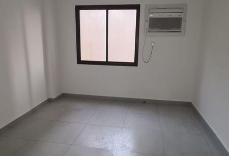 Stylish 2 BR in Al Shahid Tower: Serene Living - Photo 3