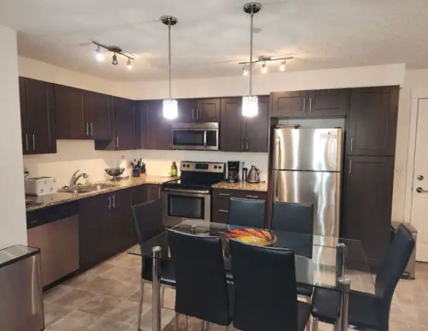 SE LIVING AT ITS FINEST! 2 BED/2 BATH/2 PARKING STALLS! CONVENIENT LOOCATION! | 755 Copperpond Blvd SE, Calgary - Photo 1
