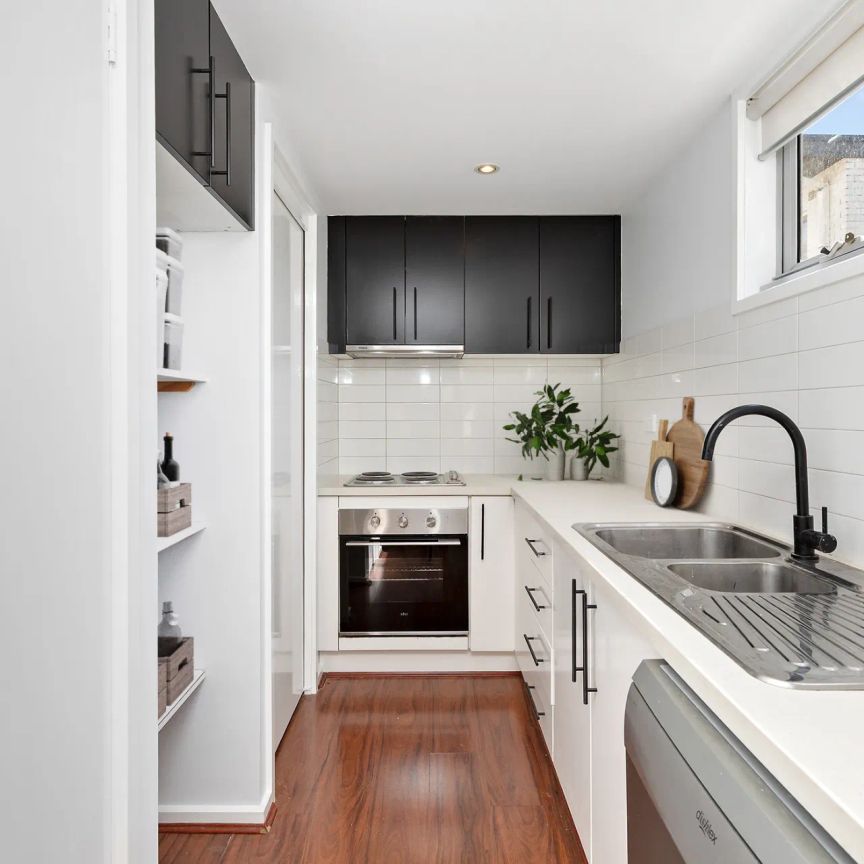 Two Floors, Two Carports, Too Good to Miss! - Photo 1