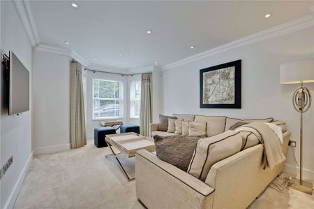 A beautifully presented four-bedroom property with off street parking and a private landscaped garden in a most popular Surrey village. - Photo 5