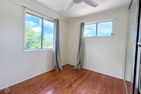 Spacious Split-Level Family Home with Multiple Living Zones & Versatile Downstairs Retreat - Photo 3