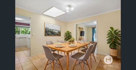 Spacious Family Home with Pool & Dual Driveways in a Prime Village Location - Photo 5