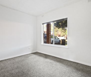 Cosy and Well-Maintained Two Bedroom Unit - Photo 6