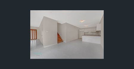 Low-Maintenance 4-Bedroom Duplex in a Convenient Location - Photo 2