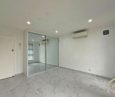 Newly Renovated Family Home in the Heart of Smithfield! - Water Inc! - Photo 2