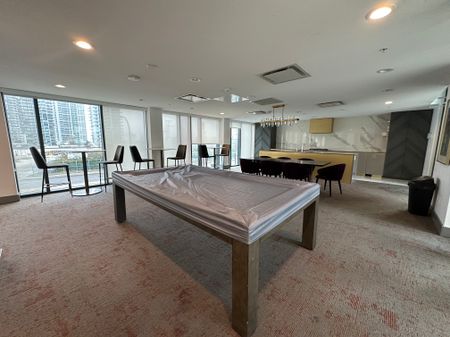 Luxury 1 Bed Condo | Brentwood Park | A/C • Views • Parking - Photo 4