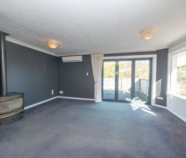 Sunny, Low-Maintenance Home and Ample Parking - Photo 3