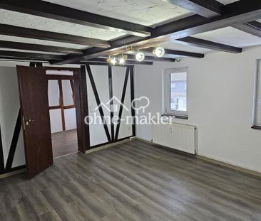 Top gepflegte 2-Zimmer-Wohnung in Trais – Modernes Bad & Keller - Foto 4