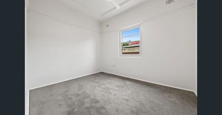 Contemporary 3-Bedroom Home with Garage - Photo 5