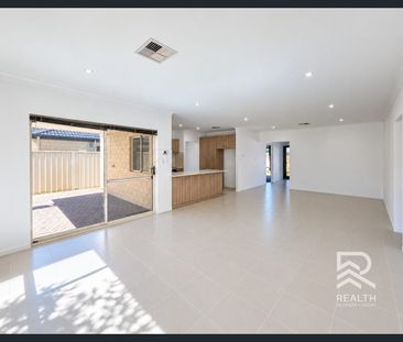 Modern 3-Bedroom Home with Theatre Room in Cannington - Photo 1