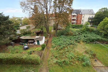 Sanierte 3-Raum-DG-Wohnung mit Garten - Foto 4