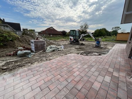 Neubauwohnung im Erdgeschoss mit großer Garage und Garten - Foto 4