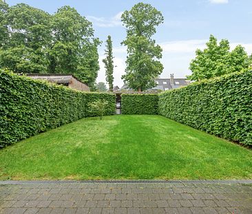 Gelijkvloers app. met tuin in het centrum van 's Gravenwezel. - Photo 2