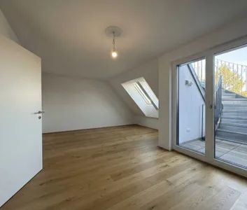 Moderne Wohnung mit Dachterrasse und Schrankraum in exzellenter urbaner Lage! - Photo 3