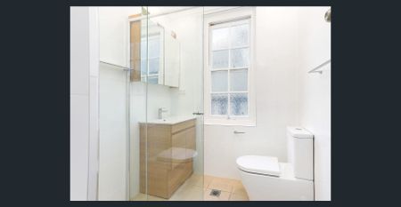 SITUATED AT THE REAR OF BUILDING - RENOVATED BEACHSIDE ABODE - Photo 5