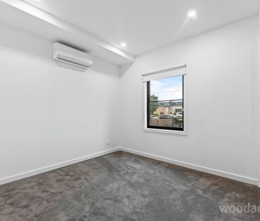 Experience Modern Comfort in this Near New Two-Bedroom Townhouse - Photo 2