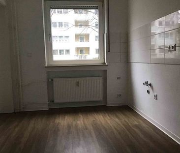 Familienwohnung im Erdgeschoss mit schönem Balkon! - Foto 1