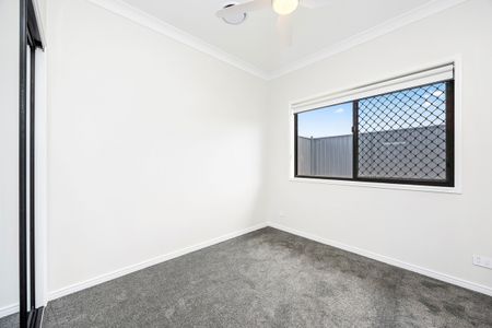 Stunning Four Bedroom Home - Ducted A/C & Media Room! - Photo 2