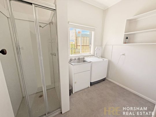 Modern Three-Bedroom Home Close to the CBD - Photo 1
