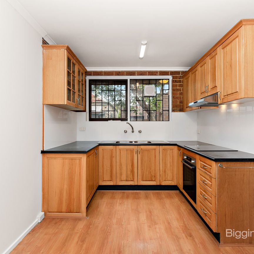 Bright & Spacious Two-Storey Home in Quiet & Convenient Location - Photo 1