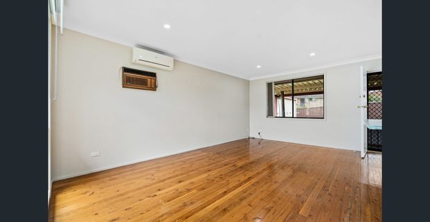 Charming family home with large shed - Photo 1