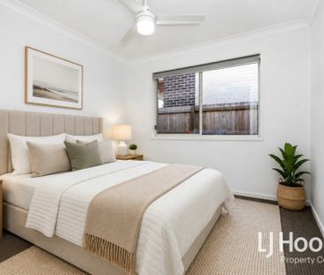 Stylish 4 Bedroom Home Close to the School! - Photo 1